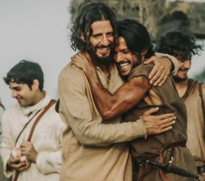 Jesus hugging a man